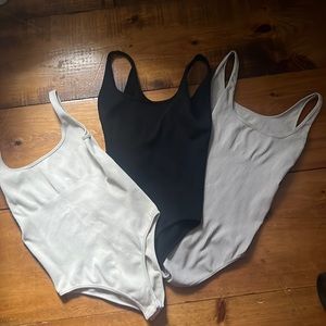 3 Automet bodysuits